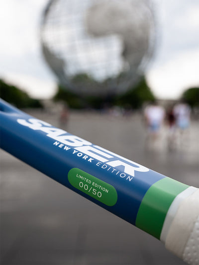 2024 New York Edition Saber from Functional Tennis with US Open Globe as backdrop