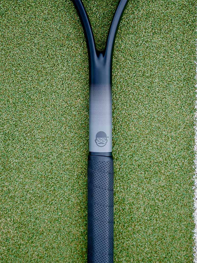 Close up of the shaft of the tennis mentor edition Saber