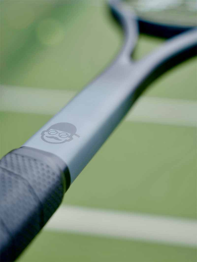 Close up of the Tennis Mentor Logo on the Saber